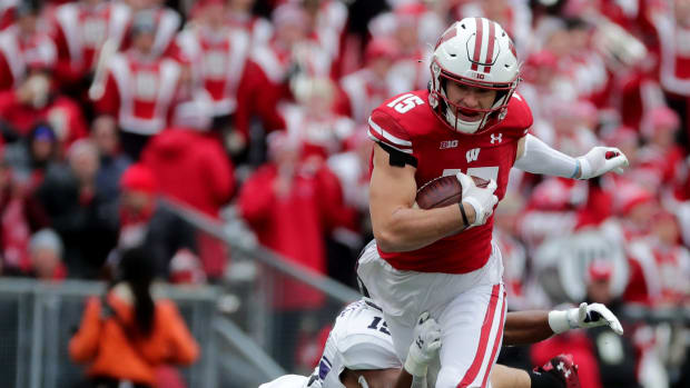 Wisconsin safety John Torchio returning an interception against Northwestern.